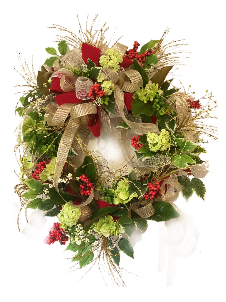 Christmas wreath with red and gold bow, green hydrangea and magnolia